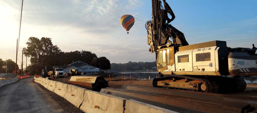 Maloney Street Over Clear Long Lake Canal project with hot air balloon