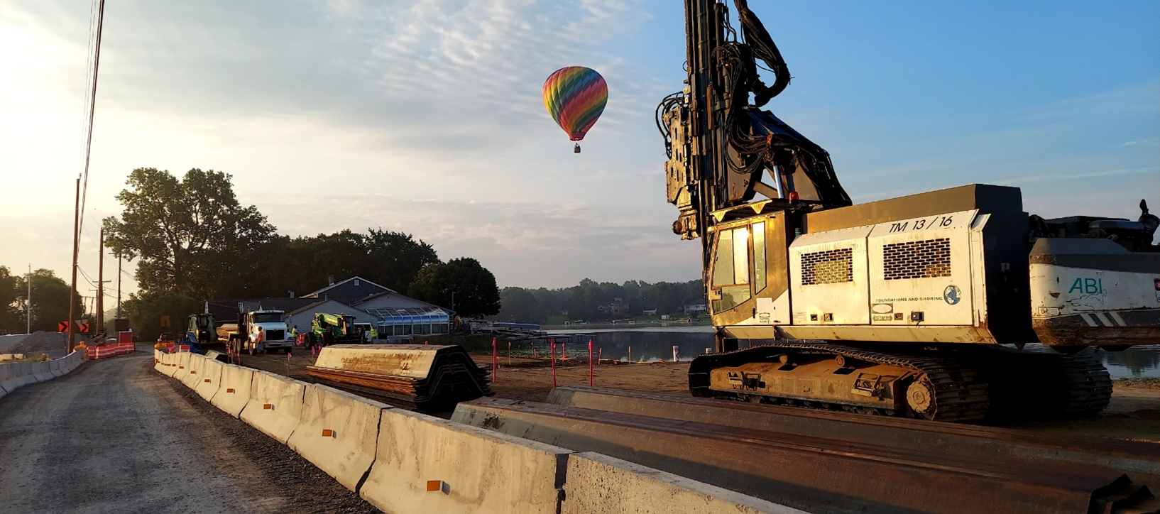 Maloney Street Over Clear Long Lake Canal project with hot air balloon